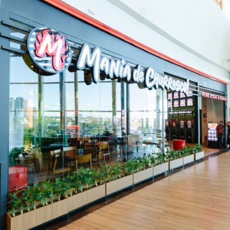 Logo da loja mania de churrasco