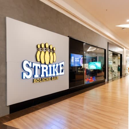 Logo da loja strike boliche